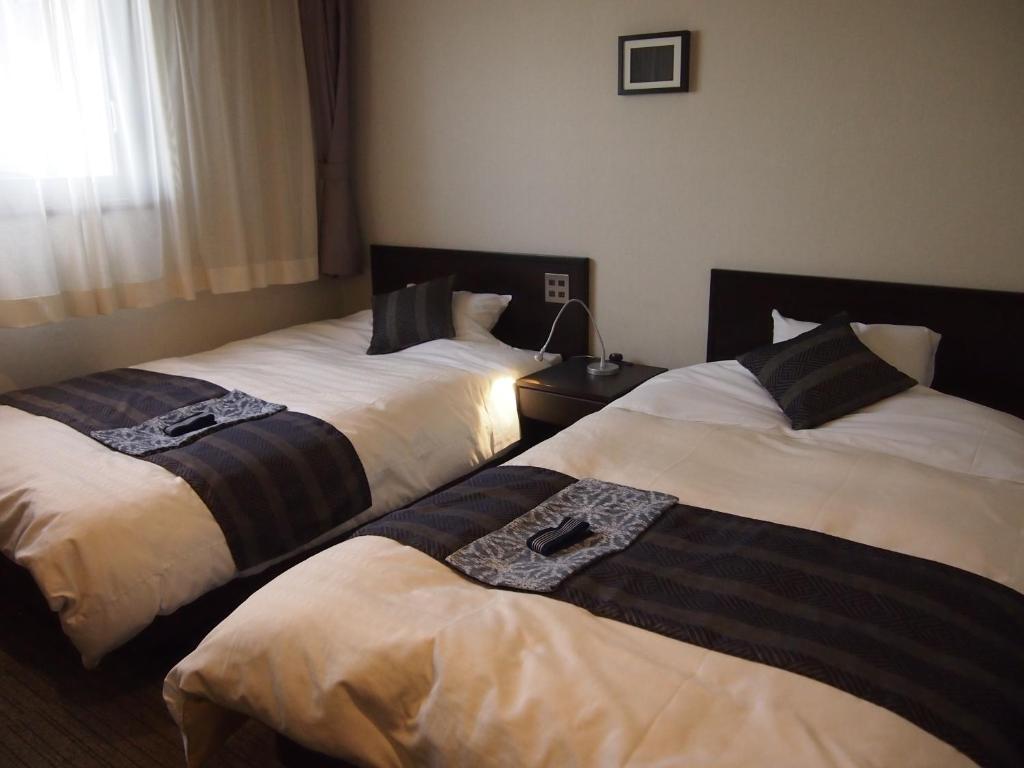 Silk Inn Kagoshima Rom bilde